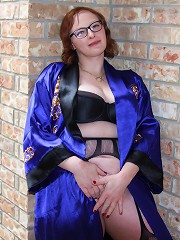 Naughty American mature lady playing with her wet pussy